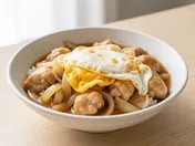 Oyakodon: A classic Japanese chicken and egg rice bowl simmered in a sweet-savory dashi-based sauce.
